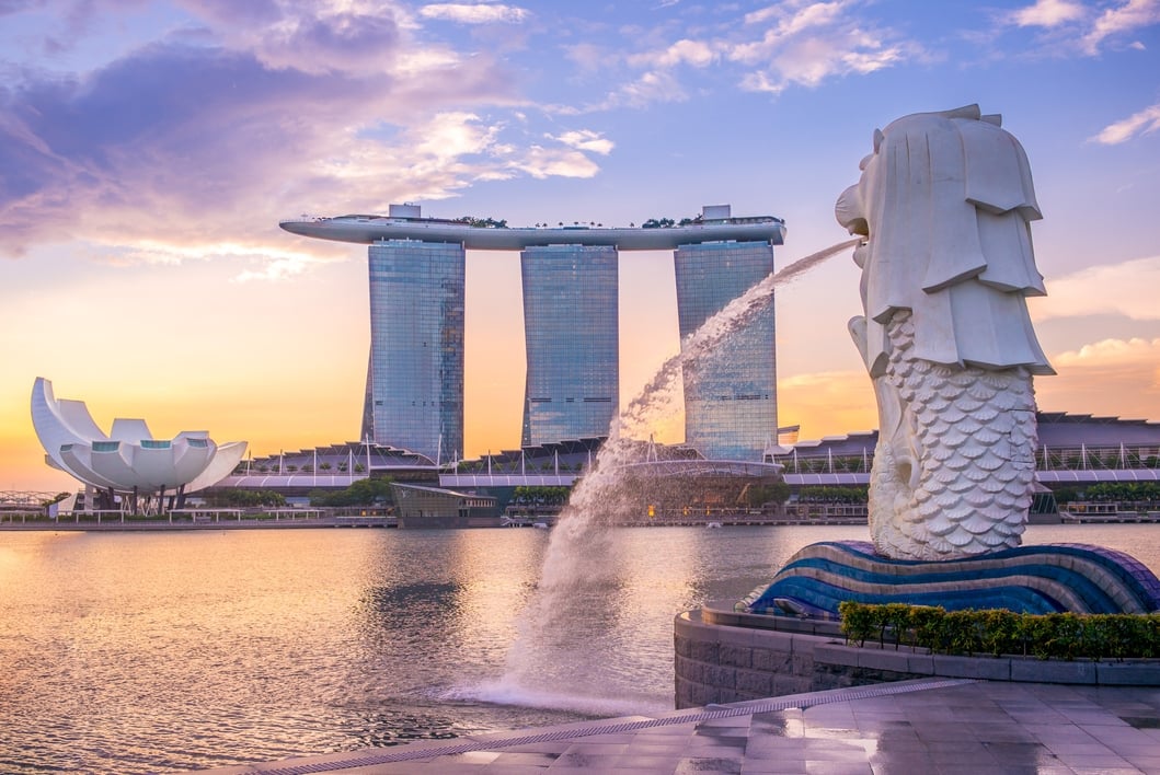 Singapore, Singapore - May 21, 2016: silhouette of Merlion Statue at Marina Bay against the sunrise. Merlion is a well known marketing icon of Singapore depicted.